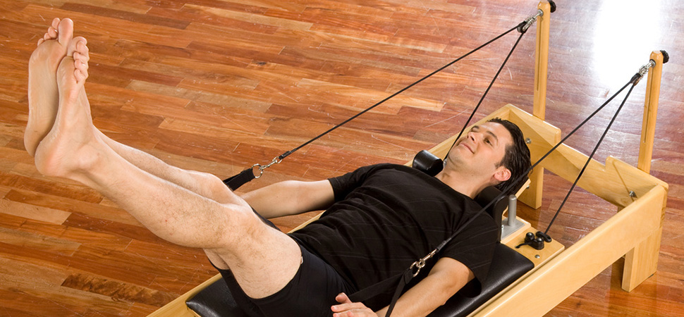 Cours particulier Pilates reformer homme